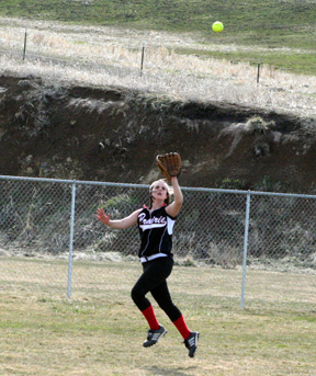 Haleigh Schmidt makes a catch in centerfield against Grangeville.