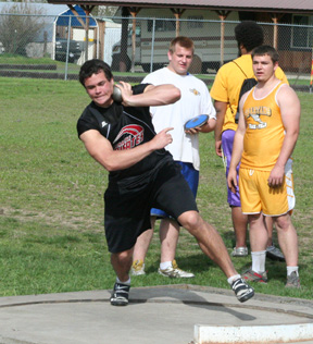 Kyler Shumway midspin in the shotput at Kamiah. He broke his school record in the event by nearly 3 feet in the meet at Lapwai April 7.