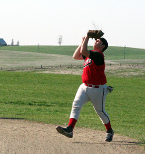 Joe Schumacher catches a pop-up at Lewis County.