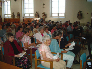 Guests gather in the monastery chapel on September 18, 2008, for the first centennial concert.