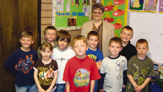 Sister Sue Ellen Drexler with first grade religion class, 2009.