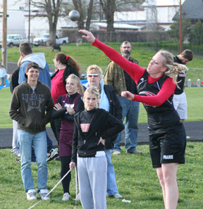 Mary Shears in the shot put at Kamiah.