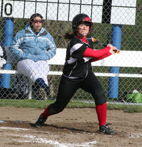 Megan Sigler watches the flight of the ball after connecting against Grangeville.