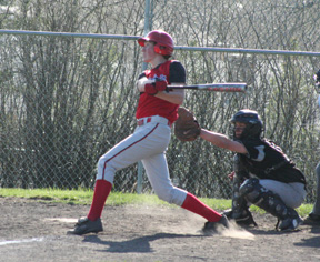 Seth Guyer takes a healthy cut at a pitch in the Kendrick game.