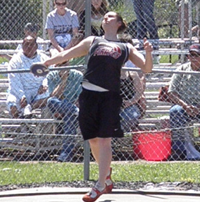 Kaylee Uhlenkott in the discus where she had a season best to qualify for State.