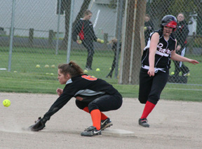 Rachel Kaschmitter pulls into second base in the first Troy game. The ball got away allowing her to go on to third.