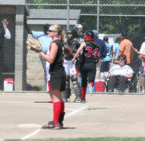 Alena Hoene heads home with the winning run against Greenleaf following Hilaree VanderPas' extra-inning double.
