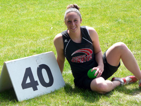 Kaylee Uhlenkott at the 40 foot mark in the shot put, a mark she broke for the first time ever.