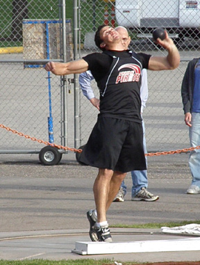 Kyler Shumway in the shot put competition.