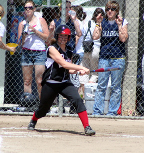 Megan Sigler triples down the right field line and then scored the first run of the championship game.