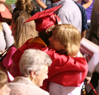 Laura Gehring gets a congratulatory hug from her mother.