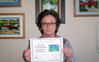 Janice Anderson, owner of Red Bird Gallery, is welcomed as a new business by the Cottonwood Chamber of Commerce