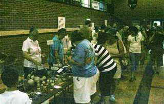 People check out products available from the Monastery and Historical Museum.