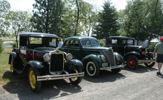 Soem of the oldest vintage vehicles at the car show.