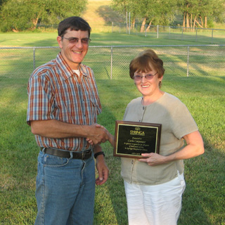 Carla Carpenter receives recognition of her 30 years of service at Syringa.