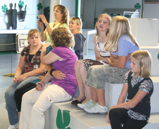 A group of models waiting for there section to be judged.