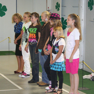 The Setting the Stage models gather as a group before the judges.