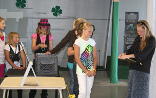 The Setting the Stage models in line waiting for their turn in front of the judges.