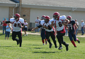 Branden Waller gained big yardage on this play. To his  left are J.C. Enriquez and Joe Schumacher.