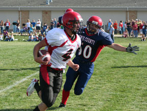Devin Schmidt carries the ball around end for a 2-point conversion.