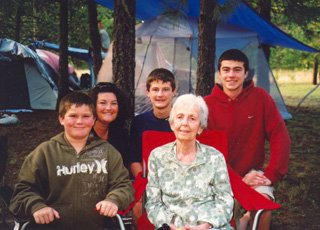 Almira Seubert with 3 of her great-grandsons and their mother. From left around Almira are Ryan, Jill, Justin and Zachary James. Jill is the wife of Almira’s grandson Brian James, pictured below, who is currently serving in Iraq. The photo was taken at the 36th annual Seubert Selway reunion.