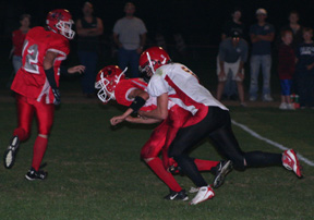 Conner Rieman sacks the C.V. quarterback for a loss.