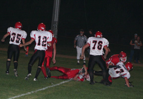 Kyle Holthaus, 17, scored on this play despite the CV defender hanging on to his leg. Also shown from left are Cody Schumacher, #35, Tim Frei, #12 and Colton Nuxoll, #76.