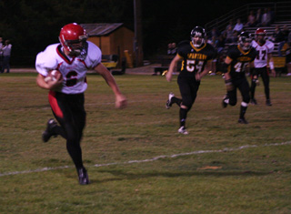 Branden Waller was all alone on the right side after taking a pass from Kyle Holthaus, far right, on Prairies first offensive play of the game. Waller went 27 yards for a touchdown.