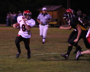 Brock Heath carried the ball around right end for good yardage.
