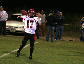 Kyle Holthaus throwing for one of his six pass completions in the game.