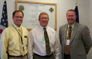 State Representative Ken Roberts, center, is shown with Kevin Rehder and Warden Lynn Guyer. Roberts was the commencement speaker at NICIs offenders graduation on Oct. 8. Photo provided by NICI.