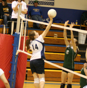 Rachel Wemhoff tries to guide the ball past a Culdesac blocker.