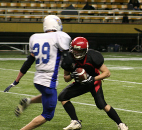 Conner Rieman makes a catch for a big gain.