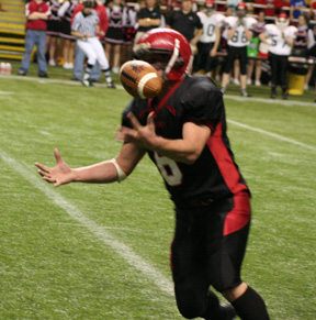 It took Branden Waller a bit to find the handle but he wound up catching the ball for an interception.