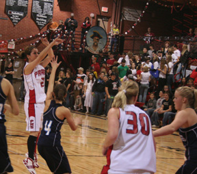 Francesca Johnson shoots the ball against Grangeville as Mary Shears jockeys for rebounding position.