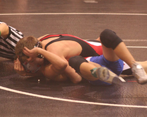 Alex Duman has his opponent in trouble.