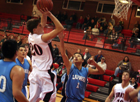 Derek Schaeffer scores in the Lapwai game. At right is Kyle Holthaus.