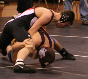 Kade Perrin battles a Kamiah wrestler at the home meet last Friday.