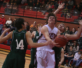Branden Waller goes for a lay-up.