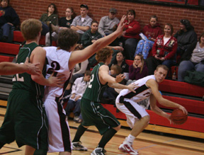 Devin Schmidt passes inside to Branden Waller whos posting up.