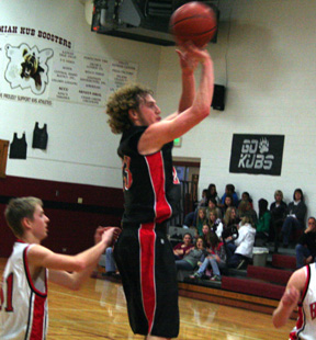 David Sigler rises up for a jump shot against the Moscow JV at the Kamiah Tournament.