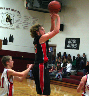 David Sigler rises up for a jump shot against the Moscow JV at the Kamiah Tournament.
