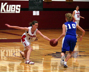 MaKayla Schaeffer tries to poke the ball away and create a turnover. In the background is Haleigh Schmidt.
