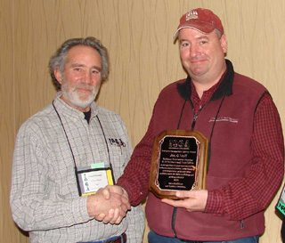 IOGA Executive Director Grant Simonds presented Joe O'Neill, BLM Outdoor Recreation Planner in Cottonwood, with the 2009 Resource Management Agency Award.
