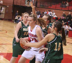 Kayla Johnson is surrounded by Culdesac defenders.