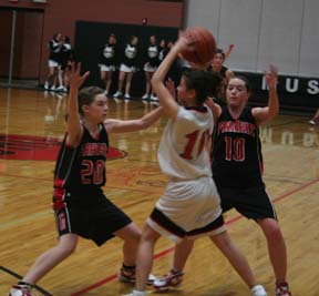 Samantha Keating and Megan Sigler doubleteam a Deary ballhandler in the backcourt.