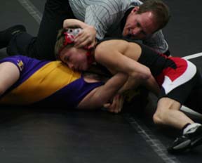 Tyler Ross goes for the pin against a wrestler from Lewiston's #2 team.