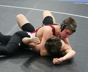Kade Perrin is about to pin an early round opponent. He finished 1st in his weight class at the Orofino Tournament.
