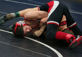 Tayler Heitman puts the hurt on an opponent in a second round match at Orofino Saturday. He wound up taking 2nd in his weight class to teammate Alex Duman.