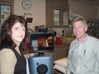 Casey Meza, CEO, SMHC/CVHC and Dr. Kelly McGrath converse with Joe Morris, CEO, Kootenai Medical Center and Dr. Kevin Kavanaugh, Heart Clinics Northwest, as a follow up to their presentation about establishing telemedicine ties with north Idaho.